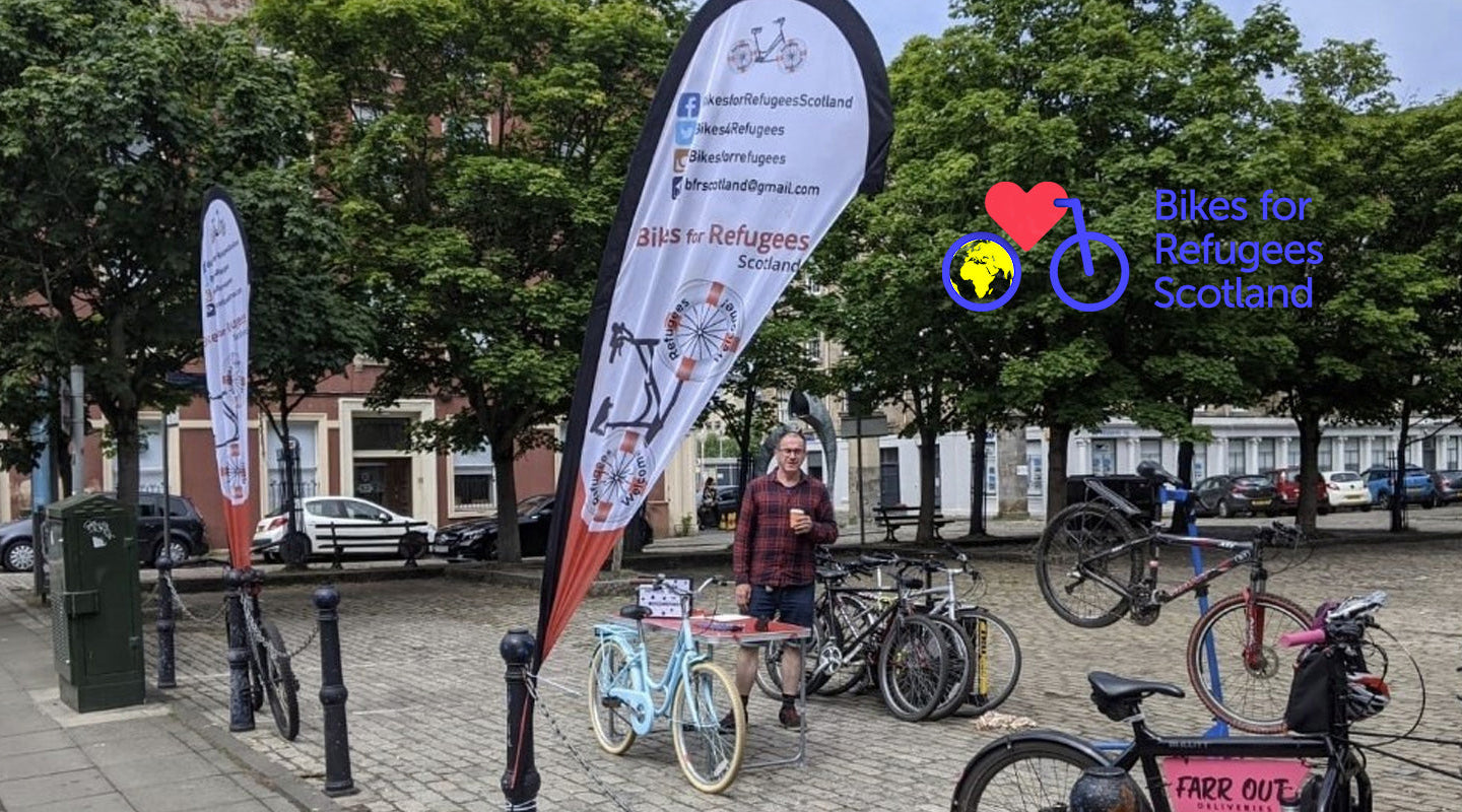 Volunteers distributing bikes to refugees in Edinburgh