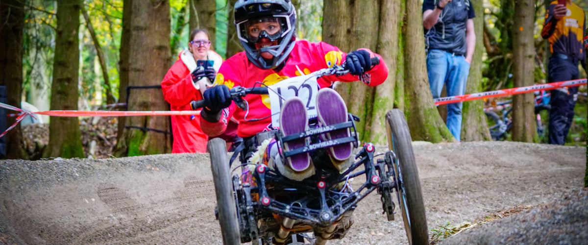 Adaptive mountain biker on the Nevis Range course at the MTB4All inclusive race