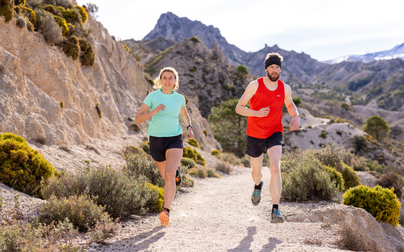 2 Trail runners wearing base layers in hot weather 