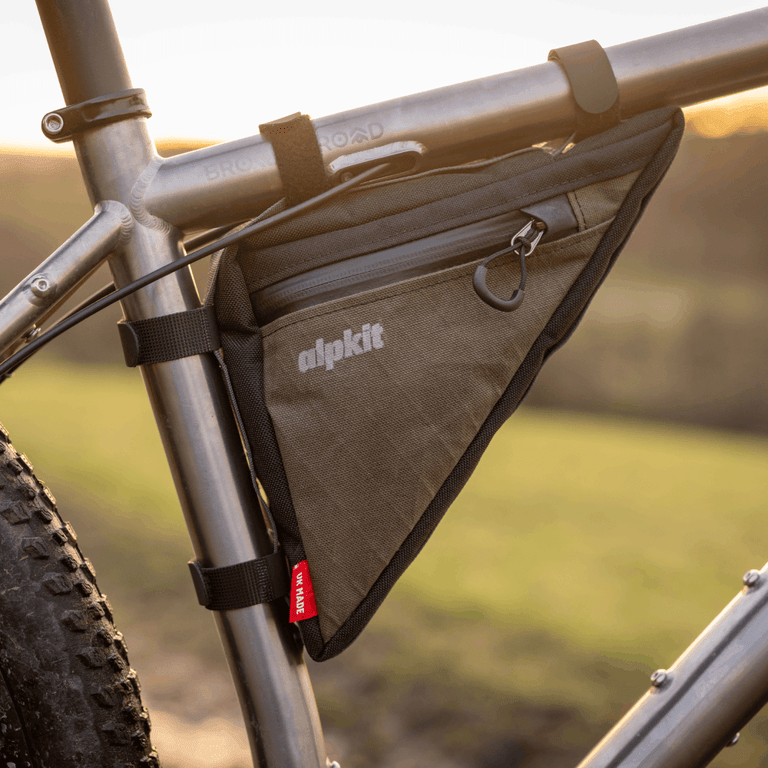 Alpkit Wombat rear frame bag in Olive green